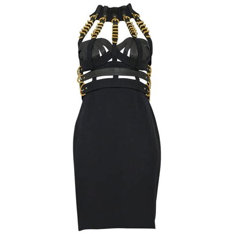 versace black dress with chains|donatella versace black dress.